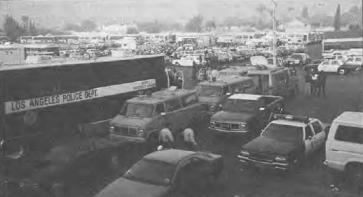 National Guard troops board buses